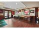 Game room featuring hardwood floors and an indoor shuffleboard table at 2016 Westbourne Way, Johns Creek, GA 30022