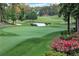 Beautiful view of the golf course with water feature and manicured green at 2016 Westbourne Way, Johns Creek, GA 30022