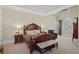 Spacious main bedroom with tray ceilings, sitting area, and ample natural light at 2016 Westbourne Way, Johns Creek, GA 30022