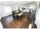 Bright dining area with a stylish table and seating, open to the updated kitchen, perfect for Gathering meals and entertaining at 2638 Cleburne Pkwy, Powder Springs, GA 30127