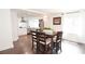 Dining room with a table, chairs, and a view of the updated kitchen, creating an inviting space for meals and gatherings at 2638 Cleburne Pkwy, Powder Springs, GA 30127