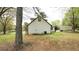 Back exterior with yard at 2638 Cleburne Pkwy, Powder Springs, GA 30127