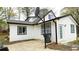 Back exterior with yard and sport equipment at 2638 Cleburne Pkwy, Powder Springs, GA 30127