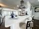 Kitchen featuring white quartz countertops, stainless steel appliances and bar seating at 2638 Cleburne Pkwy, Powder Springs, GA 30127