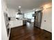 Modern kitchen with stainless steel appliances and hardwood floors at 2638 Cleburne Pkwy, Powder Springs, GA 30127