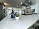 Bright kitchen featuring a quartz countertop island and stainless steel appliances at 2638 Cleburne Pkwy, Powder Springs, GA 30127