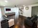 Spacious living room with modern decor, hardwood floors, and an open layout at 2638 Cleburne Pkwy, Powder Springs, GA 30127