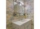 Bathroom featuring a single sink vanity with patterned wallpaper at 3312 Northcrest Rd # C, Atlanta, GA 30340