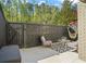 Outdoor patio with lounge seating, side table, rug, hammock, and privacy fence at 3689 Essex Ave # 16, Atlanta, GA 30339