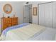 Comfortable bedroom with neutral walls, soft carpet and plenty of storage space in the built-in closet at 3689 Essex Ave # 16, Atlanta, GA 30339