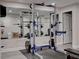 Basement gym with professional lifting equipment and mirrors at 3689 Essex Ave # 16, Atlanta, GA 30339