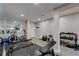 Basement gym area with exercise equipment, weights, and mirrors at 3689 Essex Ave # 16, Atlanta, GA 30339
