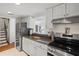 Modern kitchen featuring stainless steel appliances, sleek countertops, and ample storage space at 3689 Essex Ave # 16, Atlanta, GA 30339