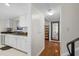 Hallway kitchenette with stainless steel appliances, sleek countertops, and ample storage at 3689 Essex Ave # 16, Atlanta, GA 30339