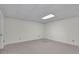 Finished basement featuring neutral carpeting, and modern ceiling at 4650 Riversound Dr, Snellville, GA 30039