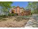 Beautiful brick home with a well-manicured lawn and a long driveway at 4650 Riversound Dr, Snellville, GA 30039