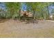 Lovely brick home nestled among mature trees and lush landscaping at 4650 Riversound Dr, Snellville, GA 30039