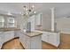 Bright kitchen featuring granite countertops and stainless steel appliances at 4650 Riversound Dr, Snellville, GA 30039