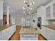 Spacious kitchen with large island, granite countertops, and stainless appliances at 4650 Riversound Dr, Snellville, GA 30039