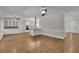 Open floor plan showing hardwood floors, neutral paint and access to kitchen at 4650 Riversound Dr, Snellville, GA 30039