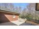 Backyard features a wooden deck overlooking green trees surrounding the house at 503 Clearwater Dr, Mcdonough, GA 30252