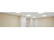Finished basement features neutral walls and multiple white doors at 503 Clearwater Dr, Mcdonough, GA 30252