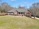 Charming, single-story brick home featuring a covered front porch and a spacious front yard at 503 Clearwater Dr, Mcdonough, GA 30252