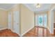 Inviting foyer with hardwood floors, decorative front door, and neutral wall colors at 503 Clearwater Dr, Mcdonough, GA 30252