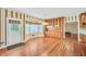 This dining area features hardwood flooring, large windows, and exterior access at 503 Clearwater Dr, Mcdonough, GA 30252