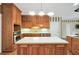 Spacious kitchen island with stainless steel appliances, wood cabinets, and ample storage at 503 Clearwater Dr, Mcdonough, GA 30252