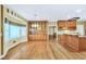 This spacious dining area features hardwood floors, a large window, and wood built-ins at 503 Clearwater Dr, Mcdonough, GA 30252