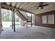 A covered patio with ceiling fan is ideal for enjoying the outdoors at 503 Clearwater Dr, Mcdonough, GA 30252