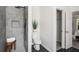 Modern bathroom with tiled shower and neutral decor at 118 Bellington Dr, Mcdonough, GA 30253