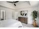 Bright bedroom showcasing trey ceilings, ceiling fan, and large picture window at 118 Bellington Dr, Mcdonough, GA 30253