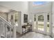 Bright foyer features a console table and modern decor at 118 Bellington Dr, Mcdonough, GA 30253
