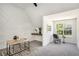 Office area featuring custom desk, neutral decor, and natural light at 118 Bellington Dr, Mcdonough, GA 30253