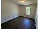 Cozy bedroom with fresh paint, stylish flooring, and natural light at 2322 Rock Mill Ne Ln, Conyers, GA 30013