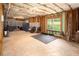 Unfinished basement with exposed ceiling, framing, and a window providing natural light at 3070 Jardin Nw Ln, Kennesaw, GA 30152