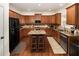 Spacious kitchen with granite countertops, stainless steel appliances, and a central island at 3070 Jardin Nw Ln, Kennesaw, GA 30152