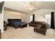 Spacious main bedroom with ample seating, and dual windows creating a relaxing atmosphere at 3070 Jardin Nw Ln, Kennesaw, GA 30152