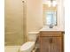Modern bathroom features a stylish vanity with a sleek countertop and a separate tiled shower at 3962 Adler Cir, Buford, GA 30519