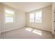 Bright bedroom featuring neutral carpet floors and white trim at 3962 Adler Cir, Buford, GA 30519