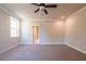 Spacious bedroom features new carpet, a ceiling fan, and white trim at 3962 Adler Cir, Buford, GA 30519