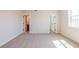 Spacious bedroom featuring carpet floors and neutral paint at 3962 Adler Cir, Buford, GA 30519