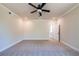 Spacious bedroom features new carpet, a ceiling fan, and recessed lighting at 3962 Adler Cir, Buford, GA 30519