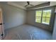 Bright bedroom with ceiling fan and large window for natural light at 1392 Cozy Circle # 349, Atlanta, GA 30315