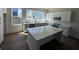Spacious kitchen featuring a large island, stainless appliances, and hardwood floors at 1392 Cozy Circle # 349, Atlanta, GA 30315