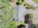 Aerial view of the home's roof, driveway, and mature trees in a residential neighborhood at 1842 Jarrett Dr, Lawrenceville, GA 30043