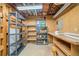 Basement storage room with shelving, pegboard walls, and a window at 1842 Jarrett Dr, Lawrenceville, GA 30043