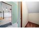 View from doorway showing basement storage area; unfinished floor and walls at 1842 Jarrett Dr, Lawrenceville, GA 30043